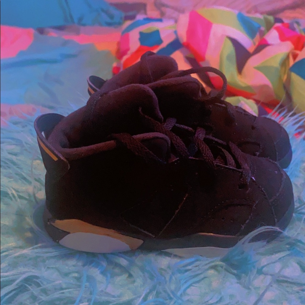 Black and gold Jordan’s